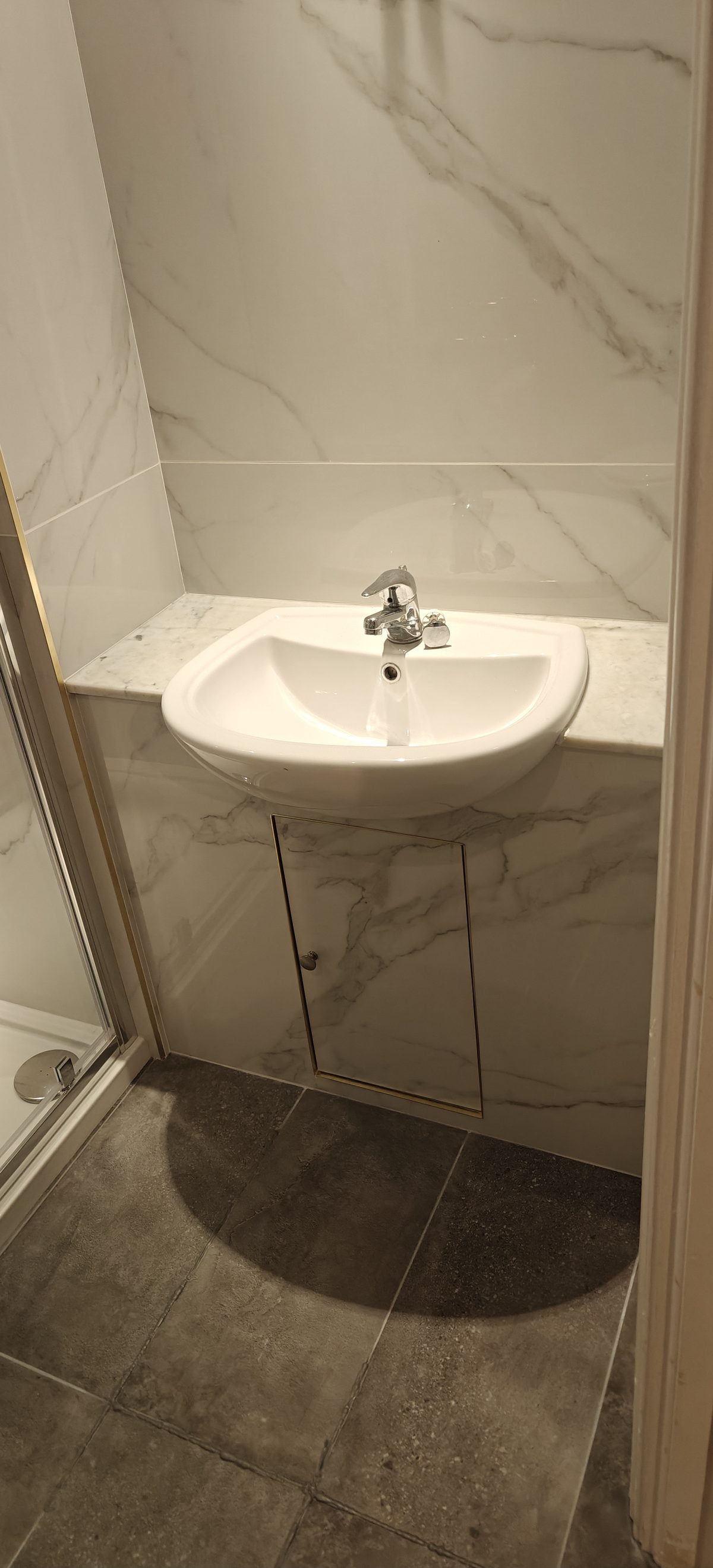 Shower fittings and pipework in a finished bathroom