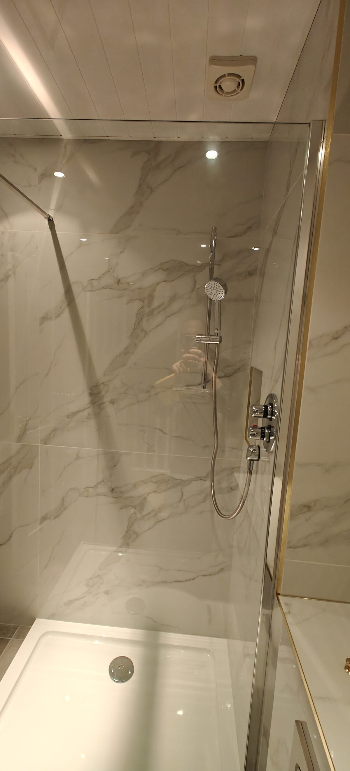 White marble ensuite with a walk-in shower and brass trim, Kildare bathroom renovation